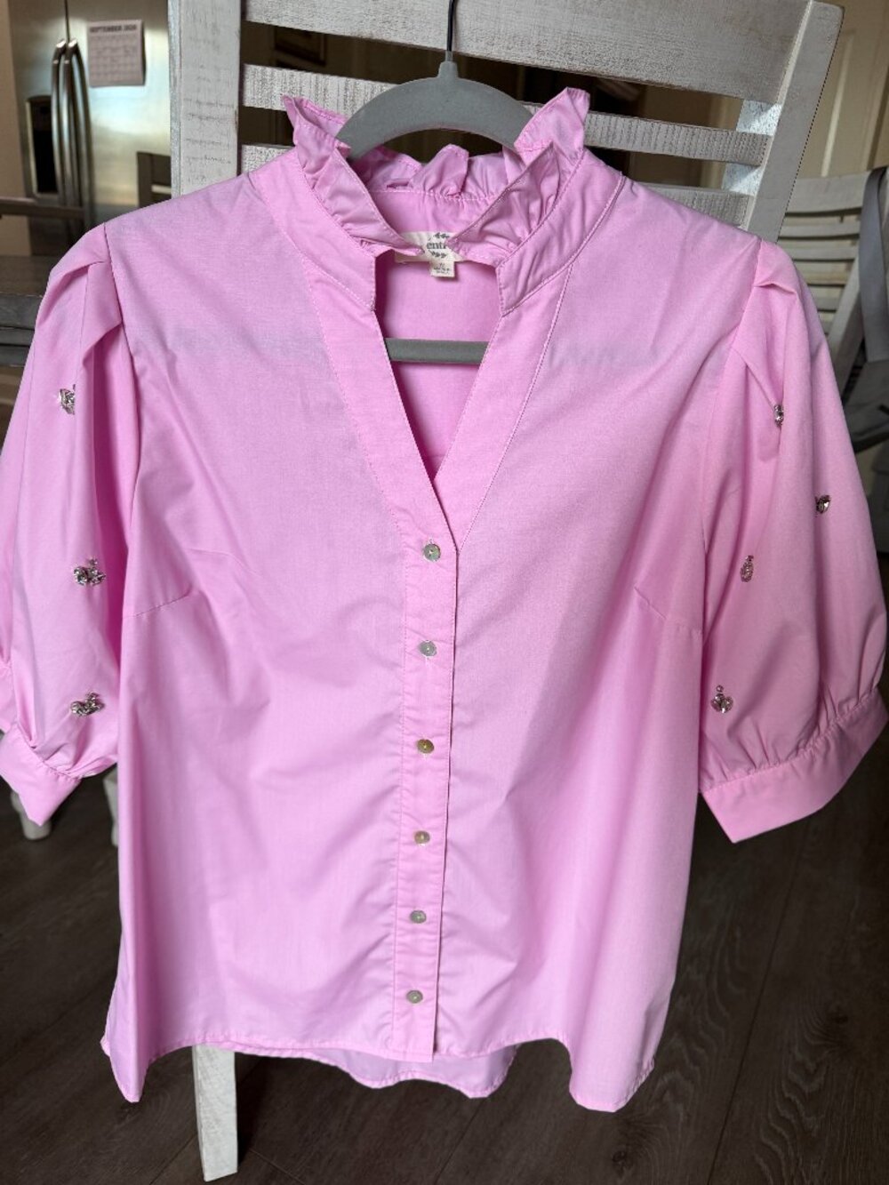 Light pink shirt with jeweled sleeves